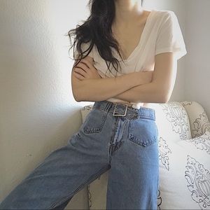 High-rise wide leg 90s jeans top-down pockets